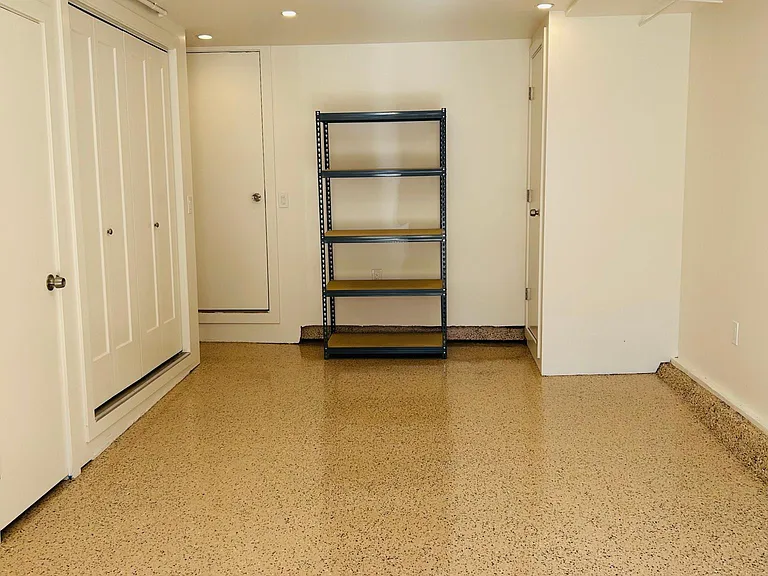 Upgraded garage with car charger and epoxy floor