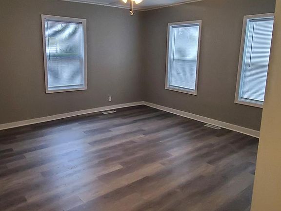 Living room with lots of natural light and custom designed ceiling