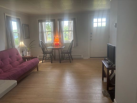 Living room with tv and dining table