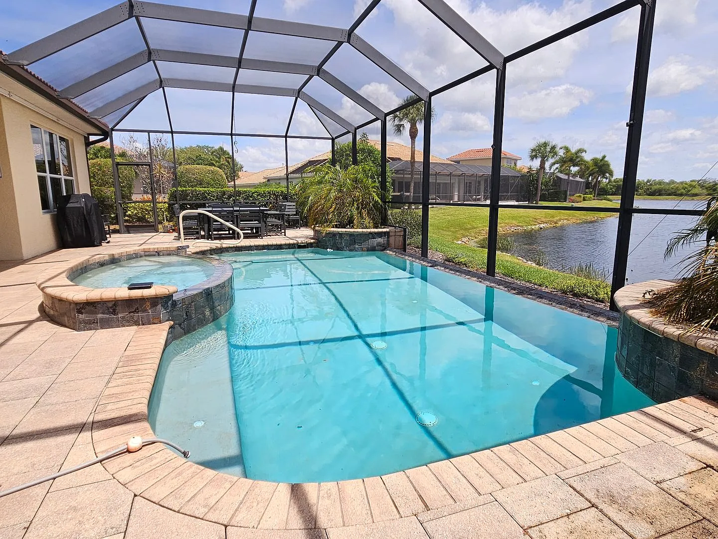 Seasonal Short-Term 4 Bedroom 3 Bathroom Heated Pool Home located in Venetian Golf & River Club! — Photo 3