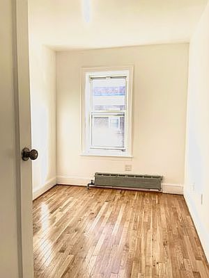 2nd image of 63-20 Haring St #2F