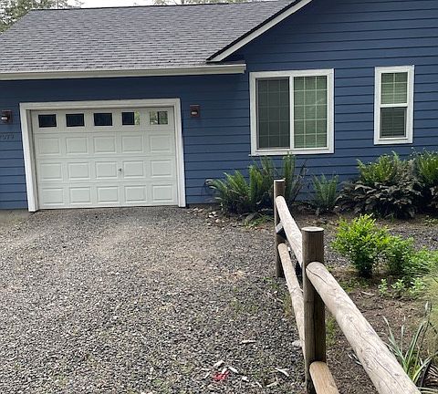 One car garage with 7" entry. Parking for one additional car outside.
