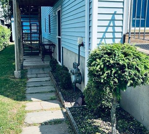 Side entrance & porch.