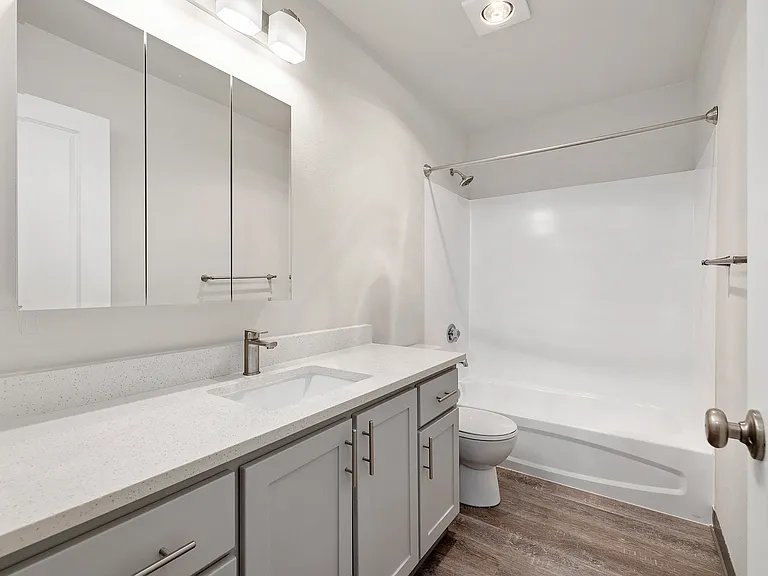 A Renovated Bathroom at The Regency Apartments