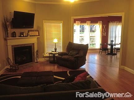 Spacious Living Room
						:
						Fireplace, Mantle, Flat Screen TV mount, opens up to kitchen