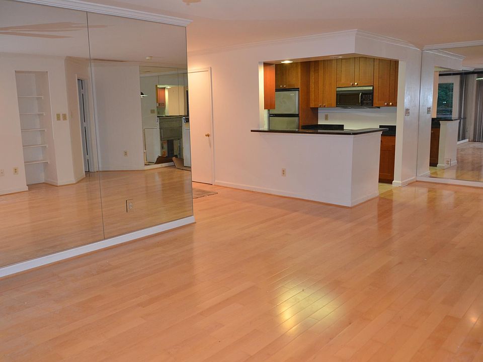 Living/dining room with mirrors