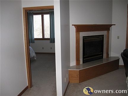 Fireplace & Entry into Master Bedroom