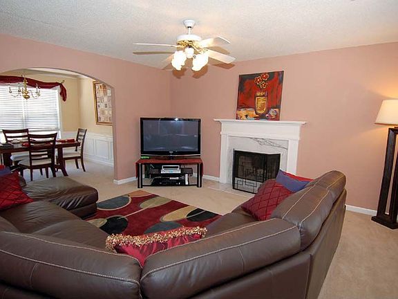 Spacious family room accomodates large TV & couch!