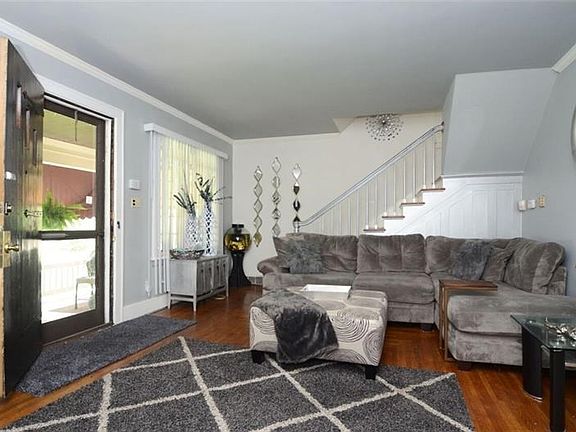 Large enough to accommodate oversized furniture, this living room is very desirable, check out those hard woods!