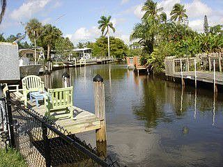Gulf access canal, dock and davits 