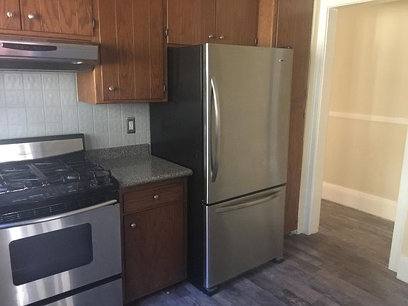 First floor kitchen. Photo taken from door into dining room--sink and dishwasher to left (not shown in photo). New fridge and di