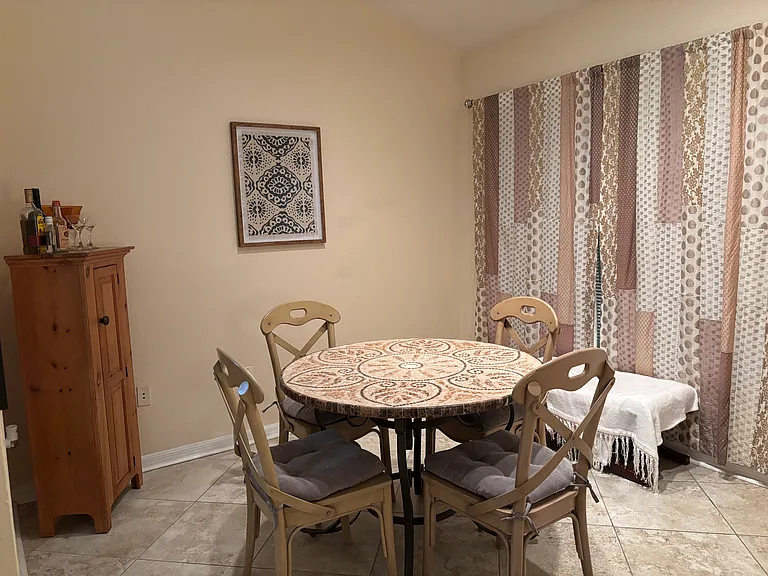 Dining room is the first room you enter when walking into the condo. The morning sunrise from the front of the house and sunsets in the back! The condo is bright and airy! Lots of natural light but not direct sunlight which makes this condo cool inside