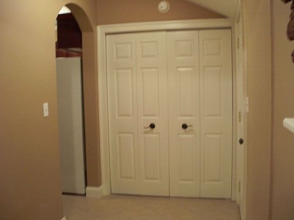 PANTRY CLOSET IN UTILITY ROOM, NEW WATER HEATER, PANTRY CABINET W/LAZY SUSAN