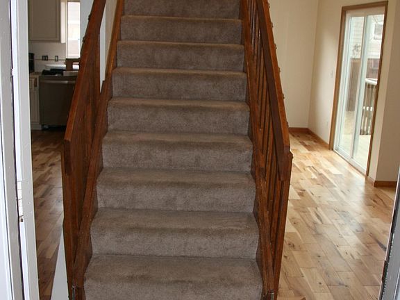 Entry way landing and stairs (Living Area #1 to right and #2