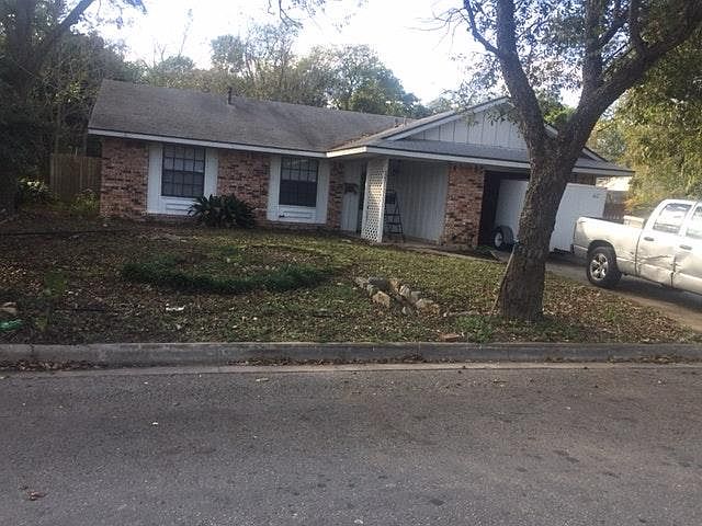 Front yard with construction truck