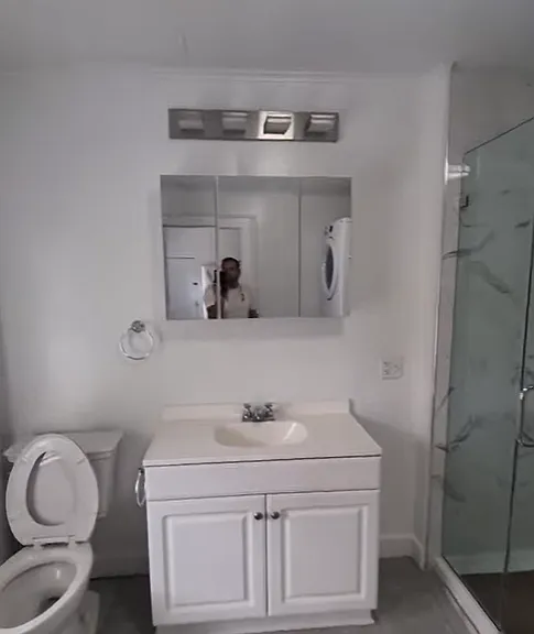 Bathroom. Shower on right side of photo.