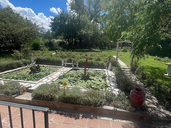 2 Lilly ponds with fountains. And fruit trees and rose bushes. We maintain the grounds at no charge to you.