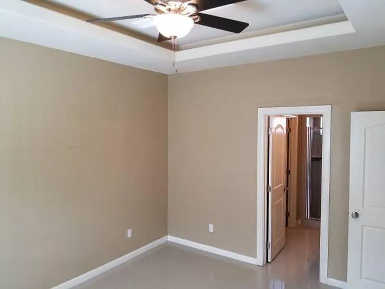 Master bedroom with attached bath room with big his and her closet