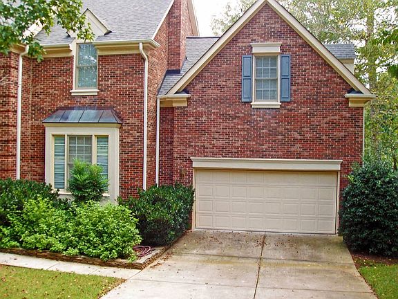 Outside front, garage right