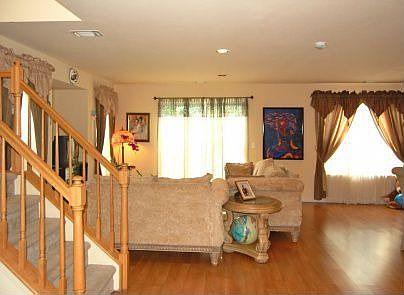 beautifully decorated home-all the window treatments stay!