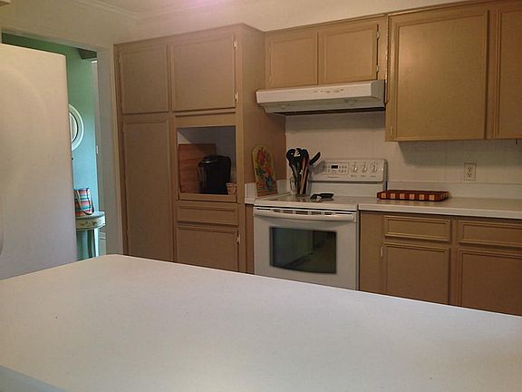 Kitchen with recent paint and lovely tile.