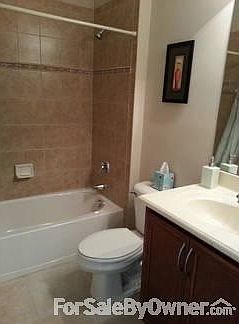 Guest Bath
						:
						Tiled stall, high sink and toilet, linen closet in bathroom