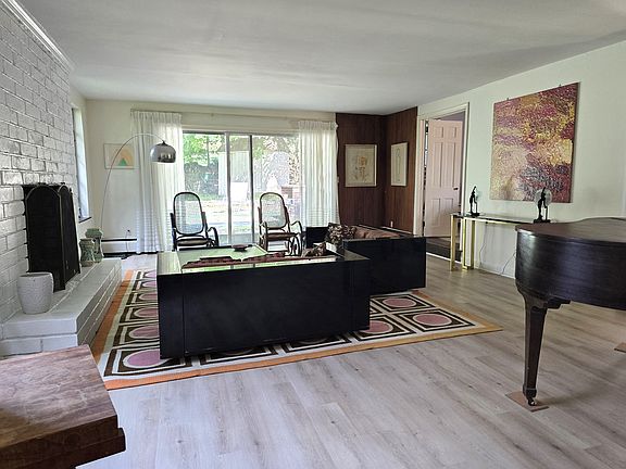Formal Living room opens to patio