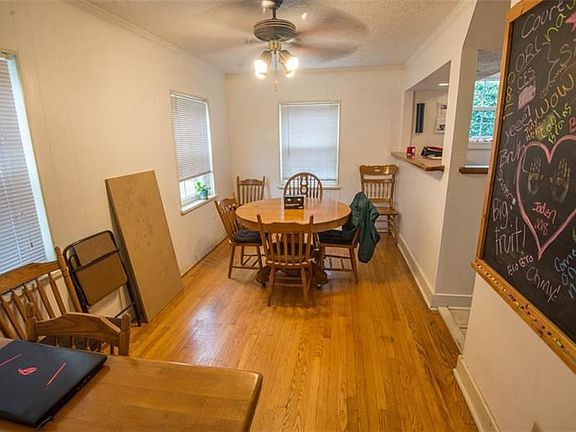 Dining room with hardwood floors.