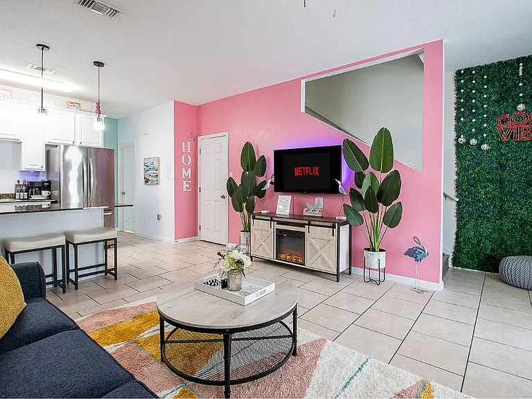 ropic like it hot in this tropical space. Good Vibes is all that you need. Enjoy the Fireplace while watching Netflix or your favorite movies on this Roku 55" Smart TV.
