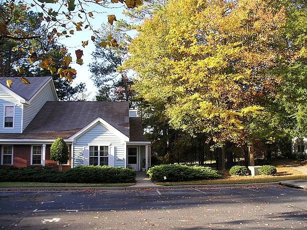 Charming end unit garden condo.