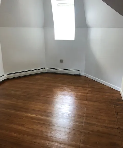 A Truly Unique Turret Dining Area, Complete With Hardwood Flooring
