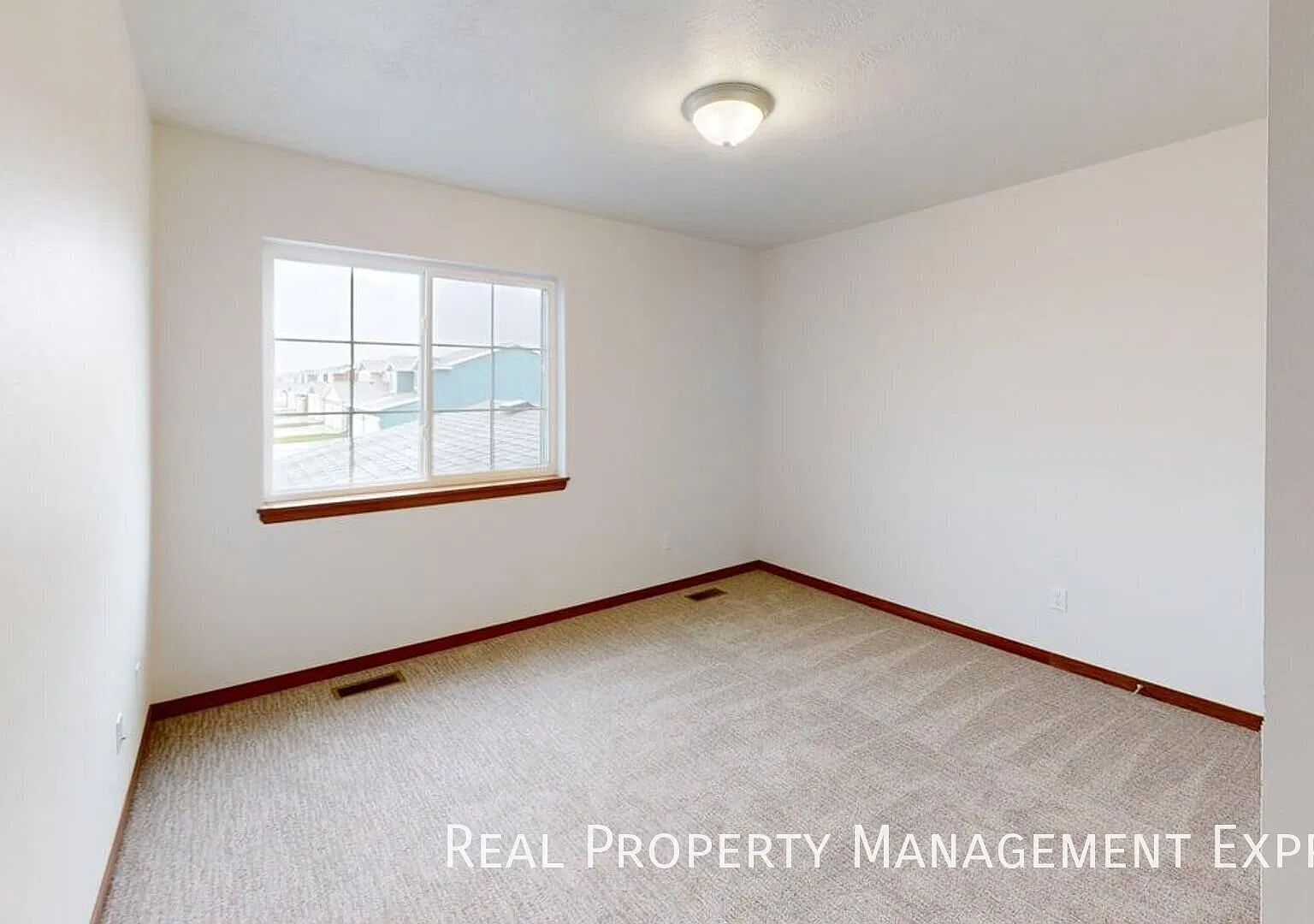 Brand-New 2-Bedroom Townhome With Garage, Patio, and Ceiling Fans — Photo 3