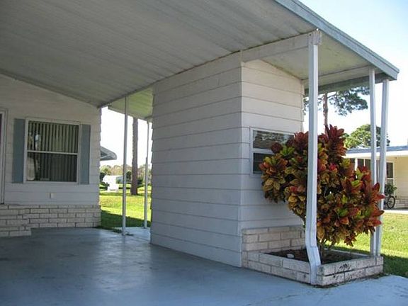 Carport and storage shed