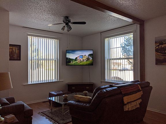 Bright Living area with Smart TV