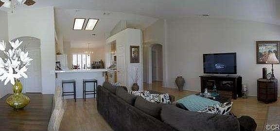 open floor plan with high ceiling.