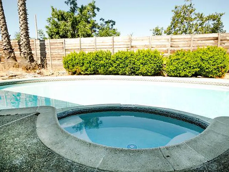 In ground pool in the backyard.