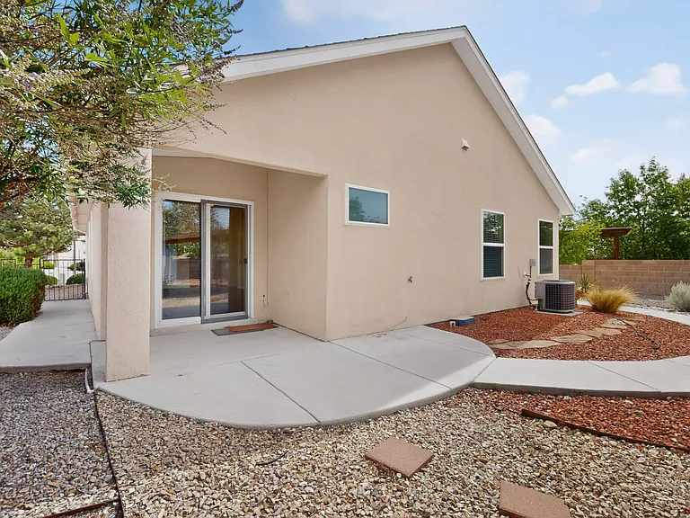 The xeriscaped front and back yards feature a beautiful southwestern landscape for beauty and low maintenance.