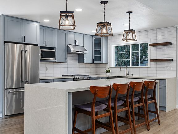 A wonderful kitchen with attractive center island and seating!