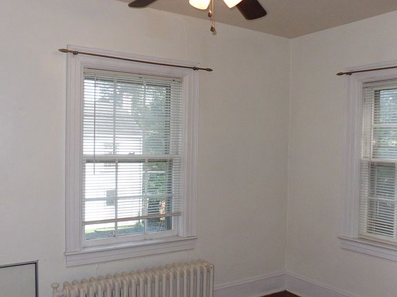 one of three bedrooms