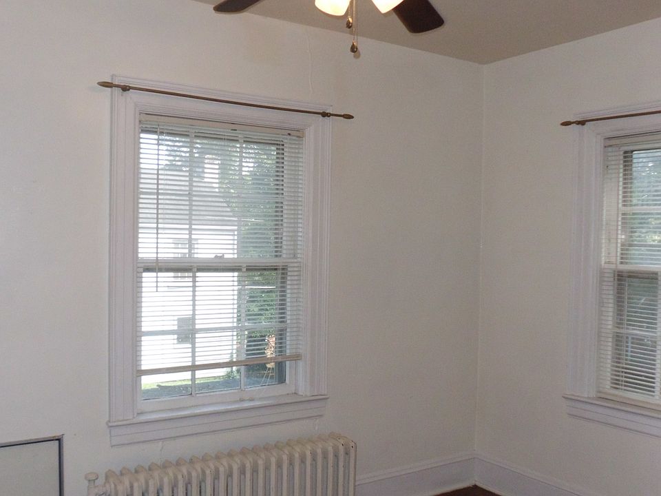 one of three bedrooms