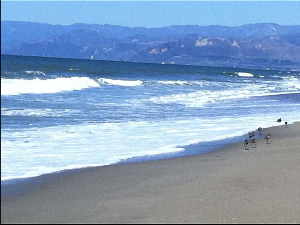 Footsteps from sand. Beach across the street with Channel Islands and mountain views.