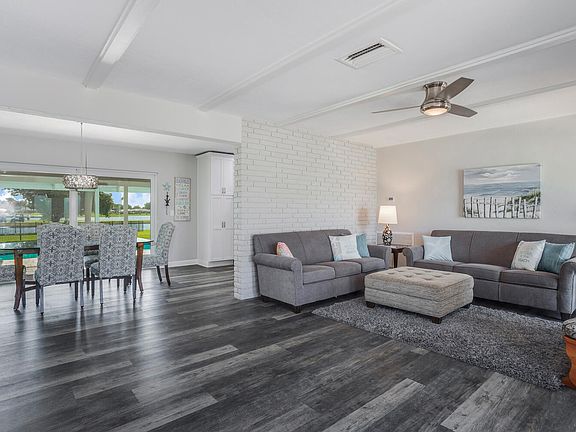 Front living area leading into dining area.
