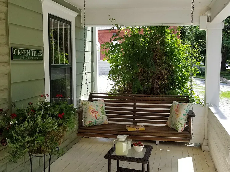 Maybe grab a cool one on the porch swing.