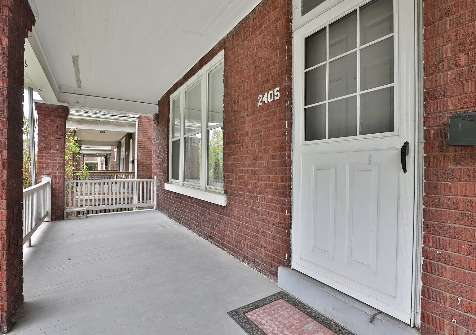 Charming 5-Bedroom Home with Exposed Brick and Modern Upgrades — Photo 3