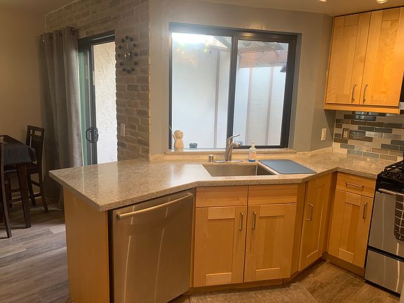 Kitchen with pass thru to Patio/Deck
