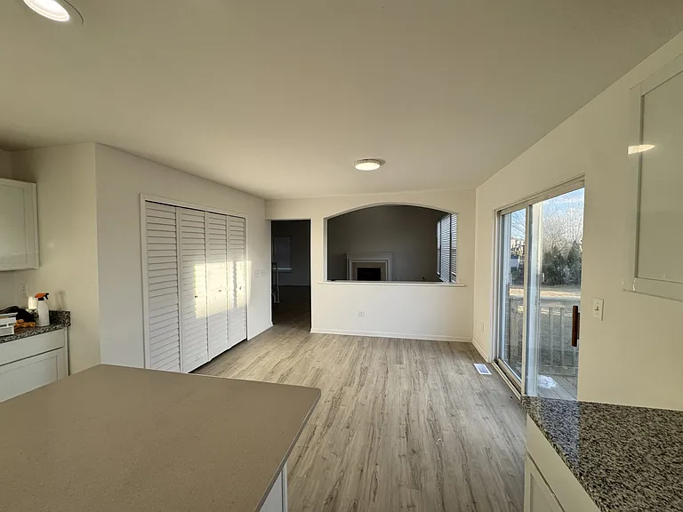 view of nook with sliding glass door to deck from kitchen