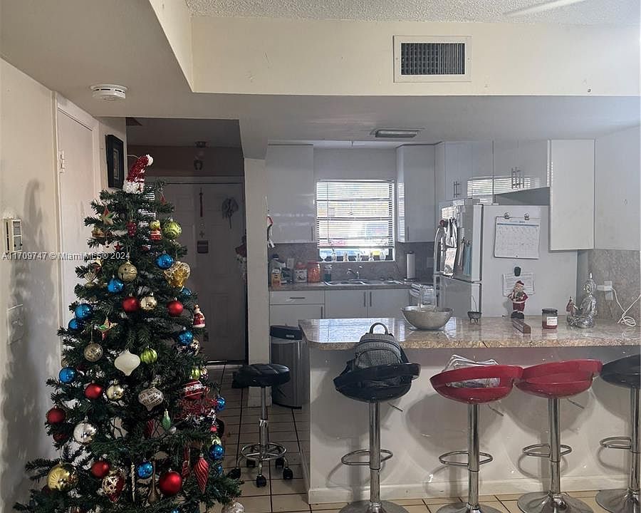 2nd image of 5764 W 26th Ave #101