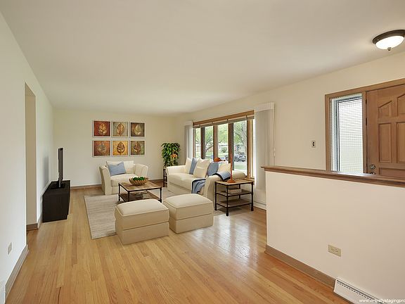 Virtually staged to show furniture placement. Lots of natural light!