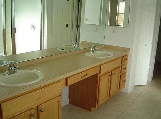 Master Bath Suite - double sinks and wood cabinets