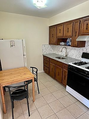 1st image of 3438 58th St #3